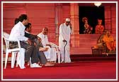 Devotees perform a drama on Parents' Day