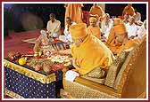 Swamishri performs the poojan on some land from the Akshardham site
  