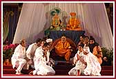 Youths perform a humorous drama in the presence of Swamishri