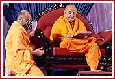 Swamishri responding to the letters sent by devotees