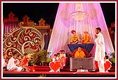 Swamishri watches the balaks' performance during the cultural program 