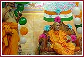 Pujya Ghanshyamcharan Swami and Pujya Krishnapriya Swami dance with kartaals