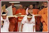 Balaks dressed as bullocks lead Swamishri to his morning walk