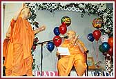 Swamishri dances with joy as Pujya Ghanshyamcharan Swami sings