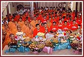 Kishores report their activities to Swamishri