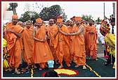  Swamishri happily greets devotees