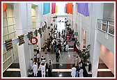 Devotees enter the Convention Center