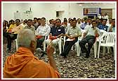Pujya Doctor Swami addresses physicians and health professional at the Medico-Spiritual Conference