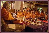  Saints sing kirtans while having darshan of Swamishri during his morning pooja 