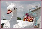 Shri Radha Krishna Dev seated on a Swan float