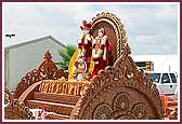 Shri Sita, Ram, and Hanumanji seated on a chariot