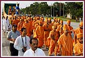 Saints joyously take part in the Shobha Yatra
