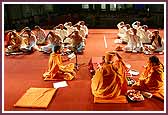 All the youths receiving diksha and their fathers perform a Mahapuja