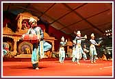 Kishores present a dance at the start of the Murti Pratishtha assembly