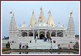 Devotees come for darshan in the Mandir