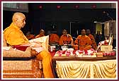   Swamishri does the mala during pooja  