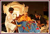 Swamishri is presented with a map depicting his vicharan 