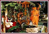  Swamishri swings Shri Harikrishna Maharaj on a hindolo at the start of the Guru Purnima celebration  