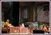 Swamishri performs mala as saints sing kirtans during his morning puja