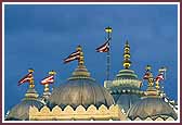 The lighted domes of the Mandir