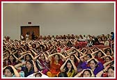 Devotees participating in the mahapuja ceremony