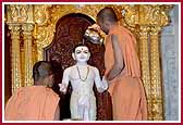 Sadhus Offering Abhishek to Shri Ghanshyam Maharaj  