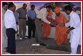 Saints performing the rituals of the groundbreaking ceremony  