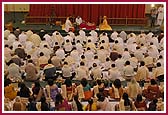 Devotees participating in the mahapuja ceremony  