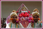 Thakorji being welcomed in the sabha in a decorated palkhi 