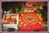 Thakorji in Mahapuja with symbolic representation of deities and muktas  