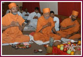 Pujya Kothari Swami and saints perform the mahapuja rituals  
