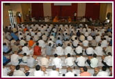 Devotees participating in the mahapuja ceremony 