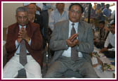 Dr. K C Patel and other senior devotees in the mahapuja ceremony