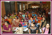 Devotees participating in the mahapuja ceremony 