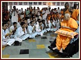 Kishores receive their final blessings from Swamishri as they depart