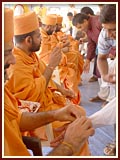 Sadhus tie raakhdi on the occasion of Rakshabandhan