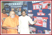 Swamishri viewing the exhibitions prepared by Kishores and Kishoris 