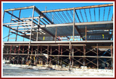 Amidst the structural beams one can see the different floor levels of the Haveli