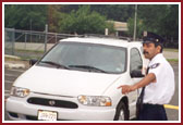 Volunteer directing the flow of cars