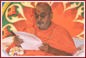 Swamishri deeply involved in reading letters from devotees