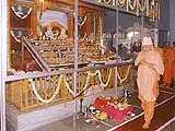 Doing pradakshina in mandir, Badalpur