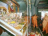 Praying to the Lord to accept the food offered in Annakut,Badalpur mandir