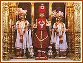 Shreeji Maharaj adorned in floral clothes, Sarangpur