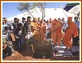 Planting a sapling on the new mandir site