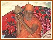 Swamishri performing rituals during a Yagna for world peace, on the eve of the mandir consecration ceremony, Durban