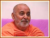 Looking benignly at the devotees