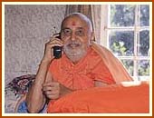 Swamishri blessing and guiding the devotees with profound compassion 