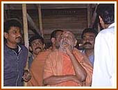 Observing the details of the exquisite wooden carvings in Mandir, 22 Aug 99