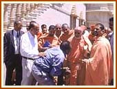 Blessing a devotee, 22 Aug 99