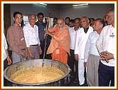Mixing a preparation of Mohanthal (sweet item), 23 Aug 99 